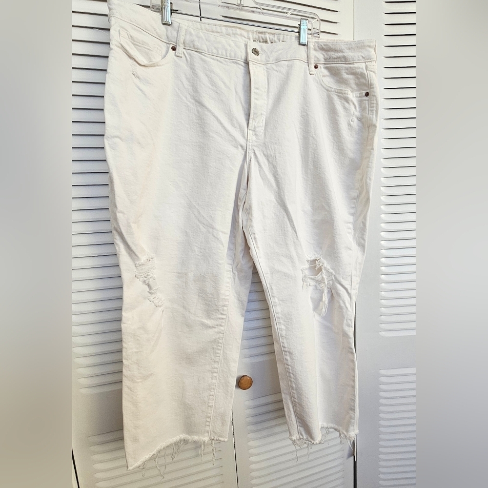 White oversized distressed jeans.